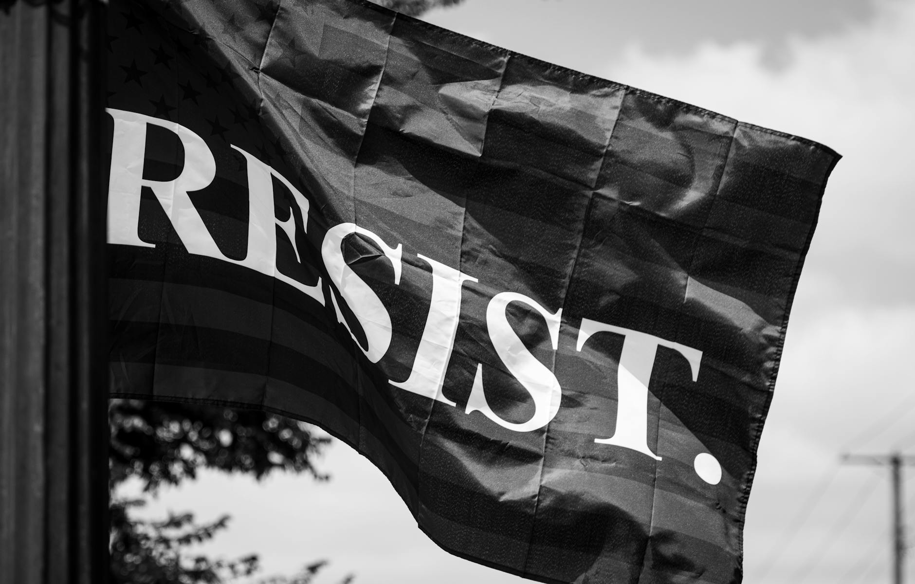 black and white resist flag waving outdoors